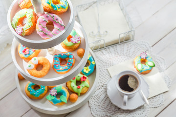 Tasty donuts with colorful decoration