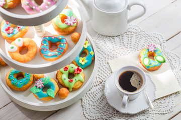 Delicious donuts with colorful decoration