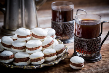 Chocolate macaroons served with coffee