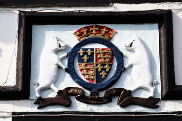 Public House Sign heraldry with shield and bear