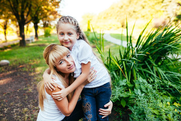 Fototapeta premium mother and daughter in the park