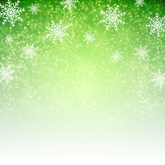 Green  christmas background with  snowflakes