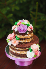 Wedding cake. Naked Wedding cake with flowers