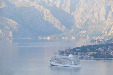 Landscape with the image of cruise liner in Kotor Bay, Montenegro