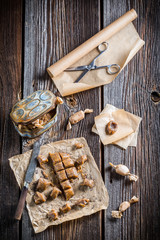 Sweet caramel with poppy seeds on baking paper