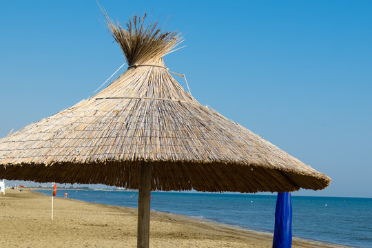 thatched beach umbrella