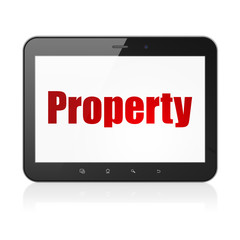 Finance concept: Tablet Computer with Property on display