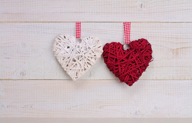 Love concept. Two Hearts  decoration over white wooden rustic background. Happy valentine's day postcard
