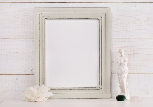 Empty picture frame rustic , shabby chic, vintage style. Romantic feminine living room  interior decoration. Copy space image