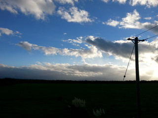 Abendstimmung mit Telegrafenmast