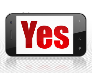 Business concept: Smartphone with Yes on display