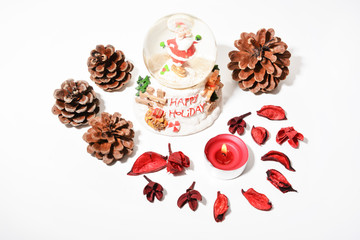 Naklejka premium Christmas background with fir cones and red candle