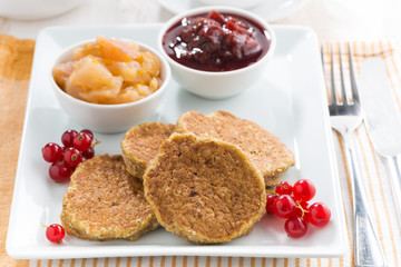 breakfast with pancakes and jams, closeup