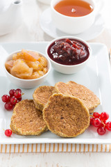 breakfast with pancakes and jams, vertical