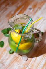 lemon and lime in a jug