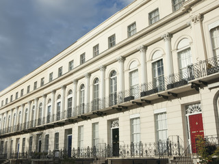 Fototapeta na wymiar Regency style terraced houses and offices in Cheltenham