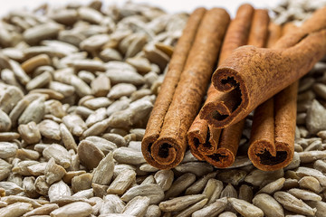 Cinnamon sticks on sunflower seeds