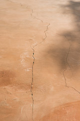 Empty cracked stone wall background