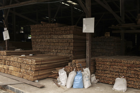 Wood warehouse/Stacked of wood in wood warehouse.