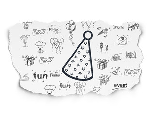 Holiday concept: Party Hat on Torn Paper background