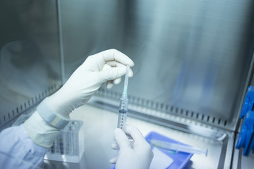 Laboratory technician prepares platelet rich blood plasma