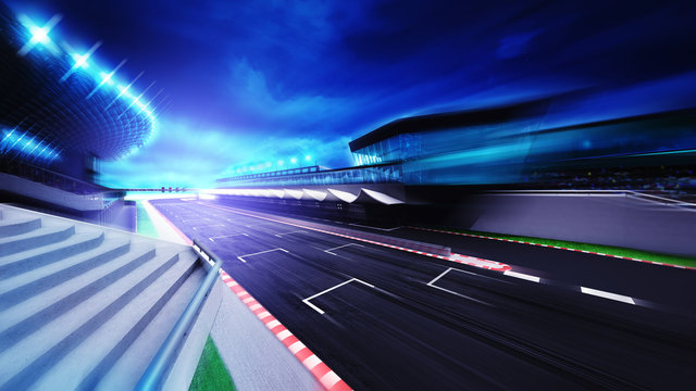 race circuit finish section in evening motion blur