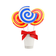 lollipops with a red bow in a paper cup isolated on a white background