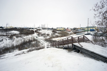 Obraz premium Wooden sidewalk in the village of Taz . Yamal Peninsula.