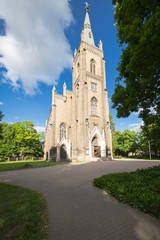 Fototapeta na wymiar Old christian church in park at summer.