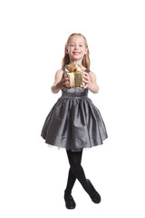 Beautiful little girl giving a present