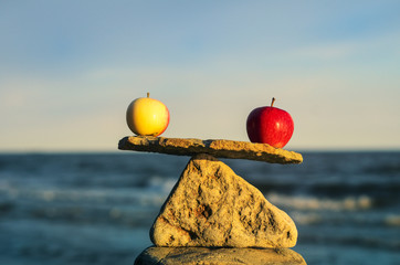 Two apples in balance - 94683257
