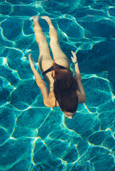 Woman Swimming Underwater