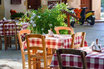 Fototapeta na wymiar Traditional Greek table at cafe on Crete island