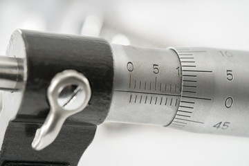Micrometer/Close up used and dirty micrometer, device used to tiny measurements on the table....