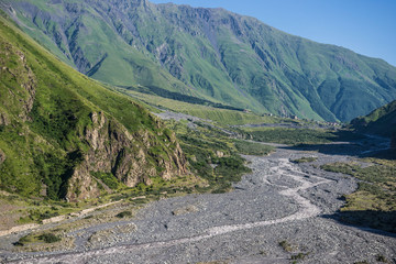 On the way from Stepantsmida town to Gergeti Trinity Church, Greater Caucasus Range in Georgia