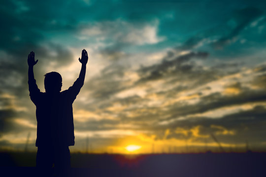 Happy man rise hand on morning view. Christian inspire praise God on good friday background. Now one man self confidence on peak open arms enjoying nature the sun concept world wisdom fun hope