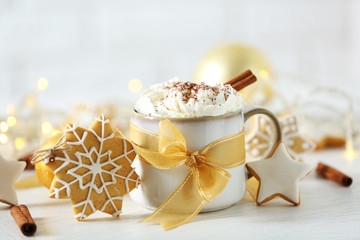 Fototapeta na wymiar Beautiful composition with cup of cappuccino and Christmas cookies