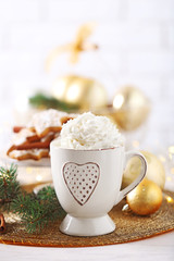 Beautiful composition with cup of cappuccino and Christmas cookies