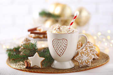 Beautiful composition with cup of cappuccino and Christmas cookies