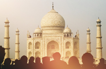 Fototapeta na wymiar View Of Taj Mahal With Tourist Silhouettes Concept