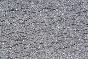 Sidewalk asphalt road with cracks