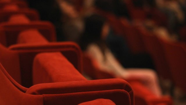 Dark Blur Audience in the cinema Theater