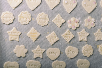 woman making ginger bread cookies in the kitchen