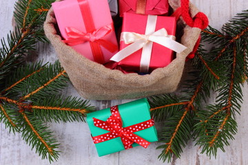 Wrapped gifts in jute bag for Christmas or other celebration