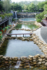 Fototapeta na wymiar luxury cozy swimming pool - swimming pool in tropical resort