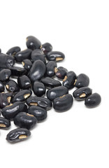 Obraz na płótnie Canvas Black beans isolated on white.