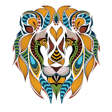 Patterned colored head of the lion. African / indian / totem / tattoo design. It may be used for design of a t-shirt, tatoo, bag, postcard and poster.