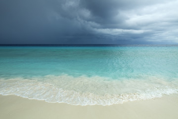Tropical beach and strom clouds on Little Curaçao, Netherlands