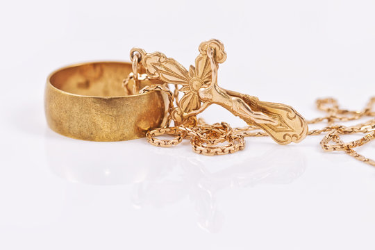 Wedding ring and gold Orthodox cross