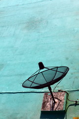 Satellite dish/Satellite dish on green floor.